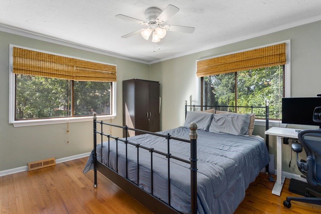 33 Trailside Way, Unit 33 Ashland, MA 01721 - Photo 17 of 26 a bedroom with a bed and a flat screen tv