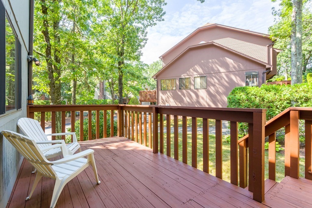 33 Trailside Way, Unit 33 Ashland, MA 01721 - Photo 22 of 26 a view of a two chairs in the balcony