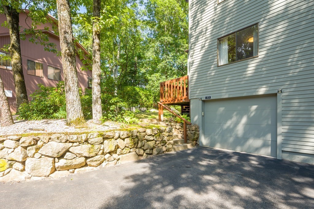 33 Trailside Way, Unit 33 Ashland, MA 01721 - Photo 23 of 26 a view of back yard of the house