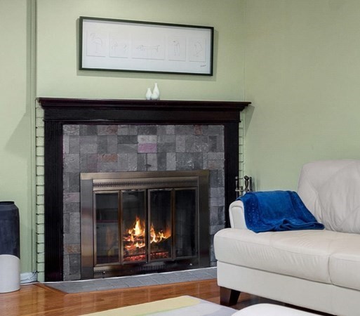 33 Trailside Way, Unit 33 Ashland, MA 01721 - Photo 7 of 26 a living room with furniture and a fireplace