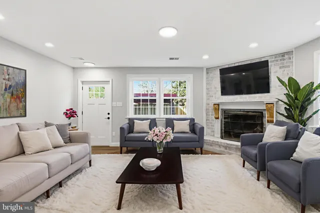 a bathroom with a toilet a sink and bathtub