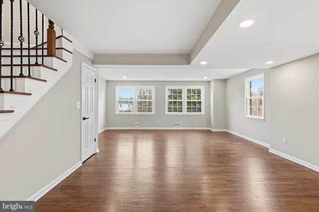 a view of cabinets and wooden floor