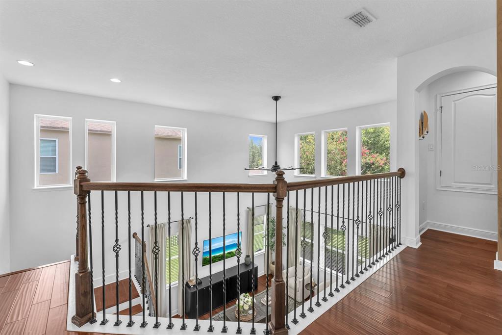 5310 Fishhawk Ridge Drive Lithia, FL 33547 - Photo 20 of 52 a view of hallway with wooden floor