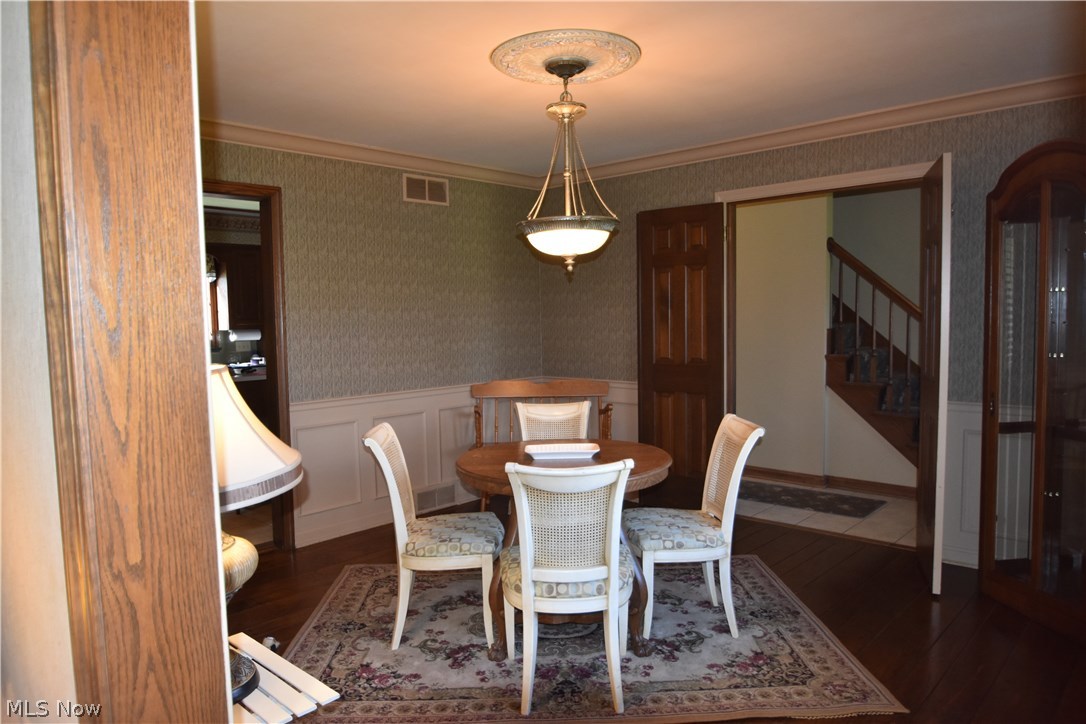 7844 South Raccoon Road Canfield, OH 44406 - Photo 16 of 30 Lovely dining room with oak peg plank floor. Crown molding.