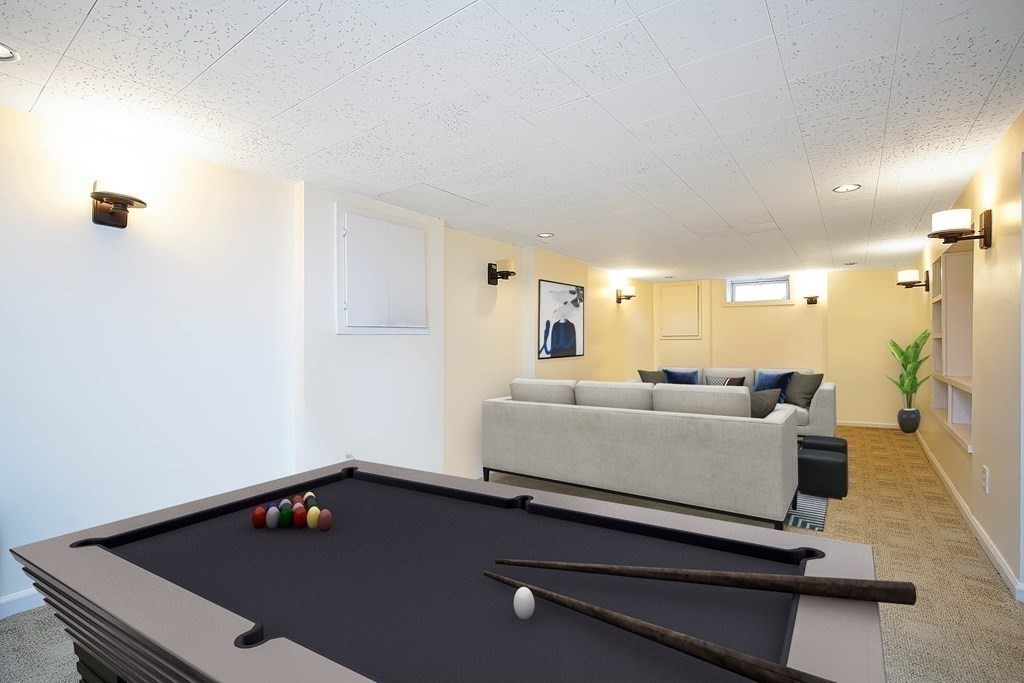 105 Lancaster Street Springfield, MA 01118 - Photo 27 of 38 a living room with furniture pool table and a window