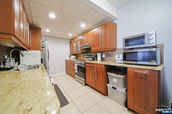 a bedroom with a bed and furniture