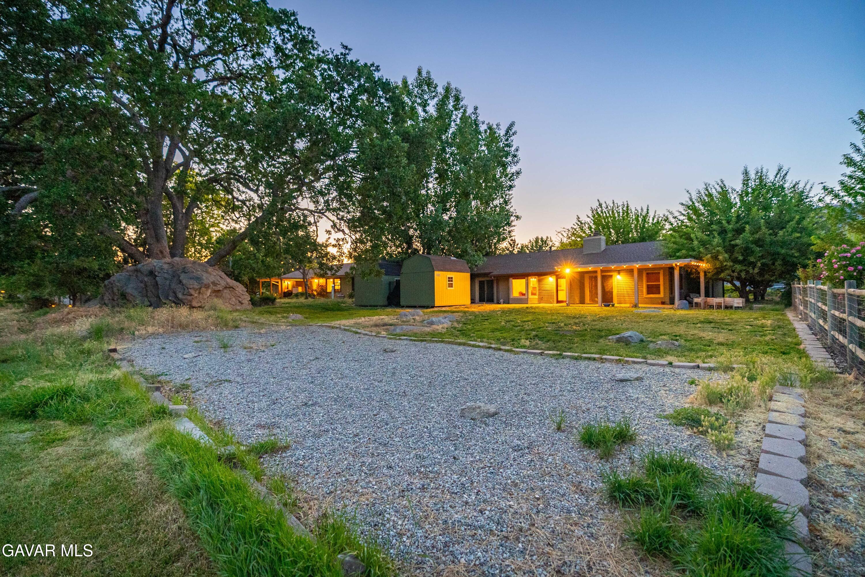 24050 Basin Harbor Court Tehachapi, CA 93561 - Photo 33 of 55 a front view of a house with a yard