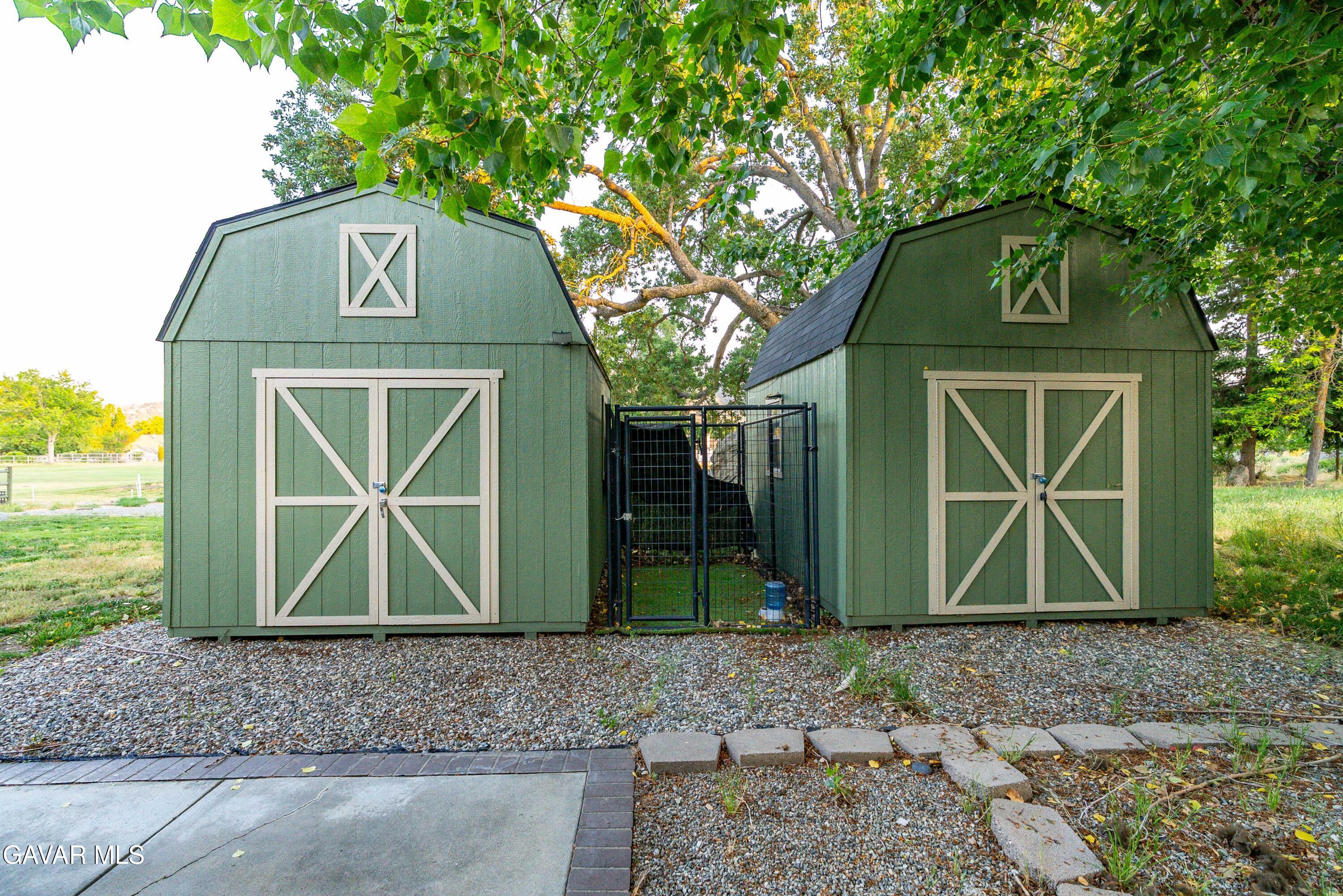 24050 Basin Harbor Court Tehachapi, CA 93561 - Photo 38 of 55 a front view of a house with garden