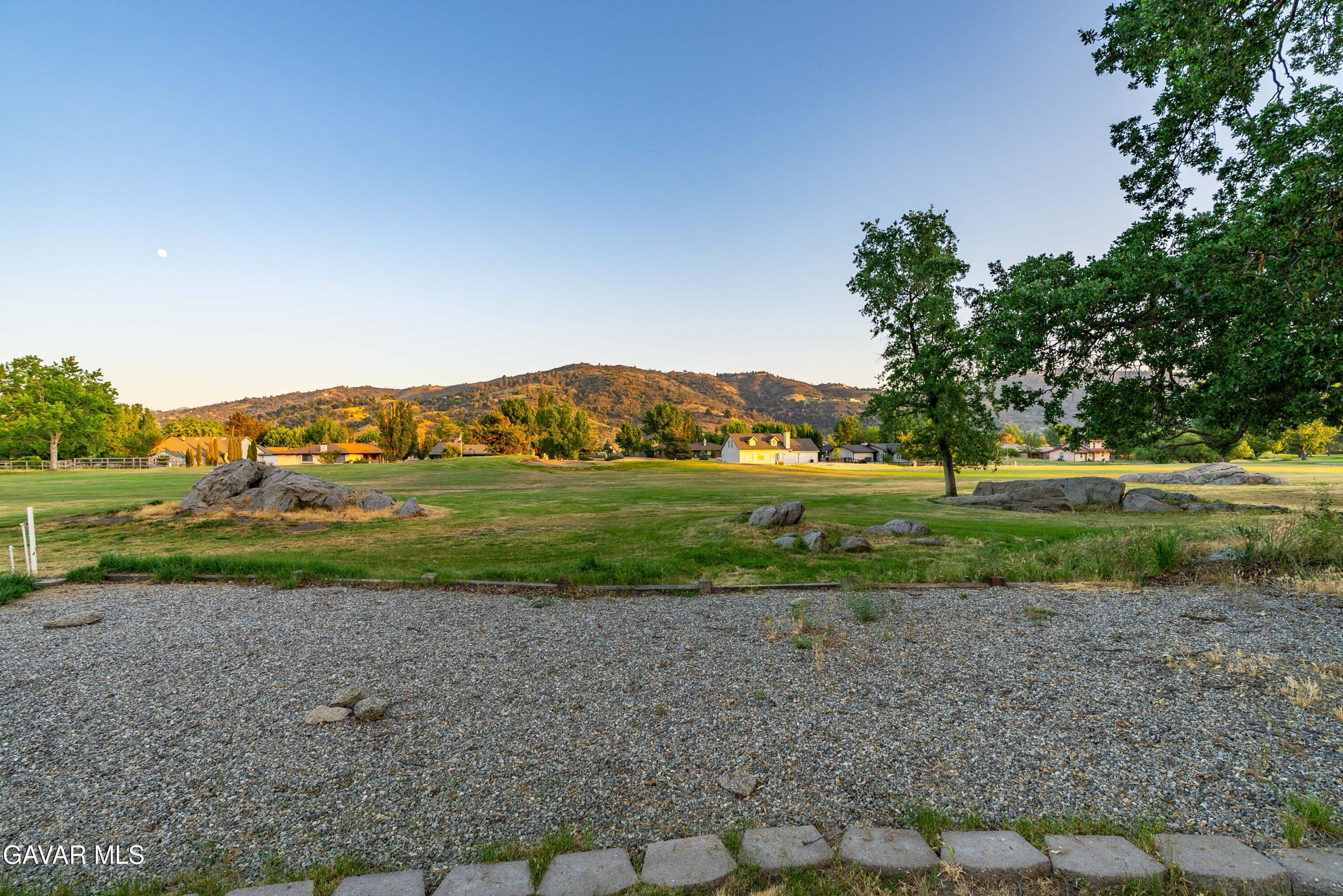 24050 Basin Harbor Court Tehachapi, CA 93561 - Photo 41 of 55 a view of a green field