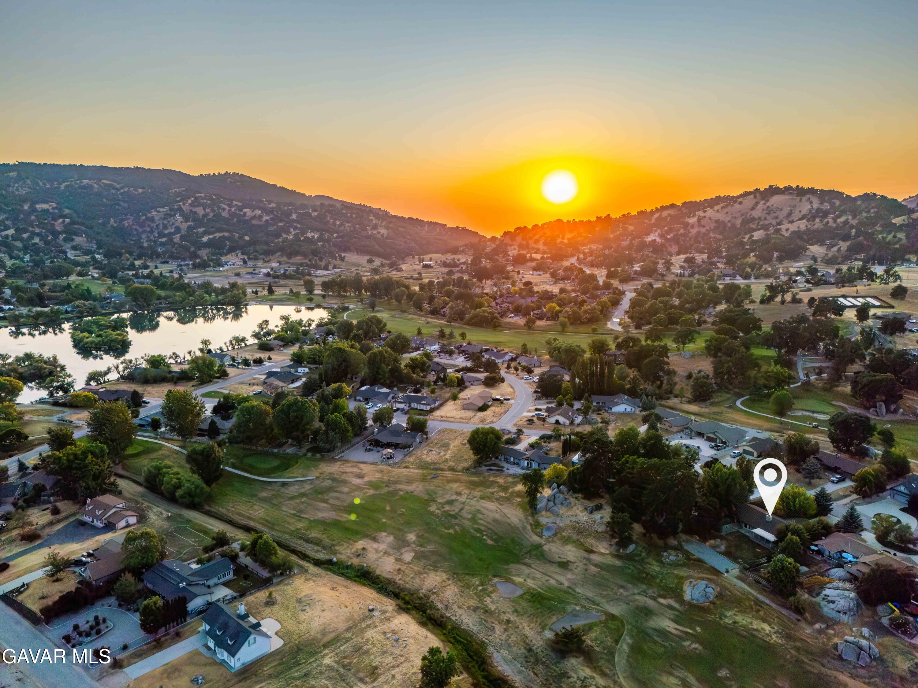24050 Basin Harbor Court Tehachapi, CA 93561 - Photo 47 of 55 an aerial view of residential house and sandy dunes