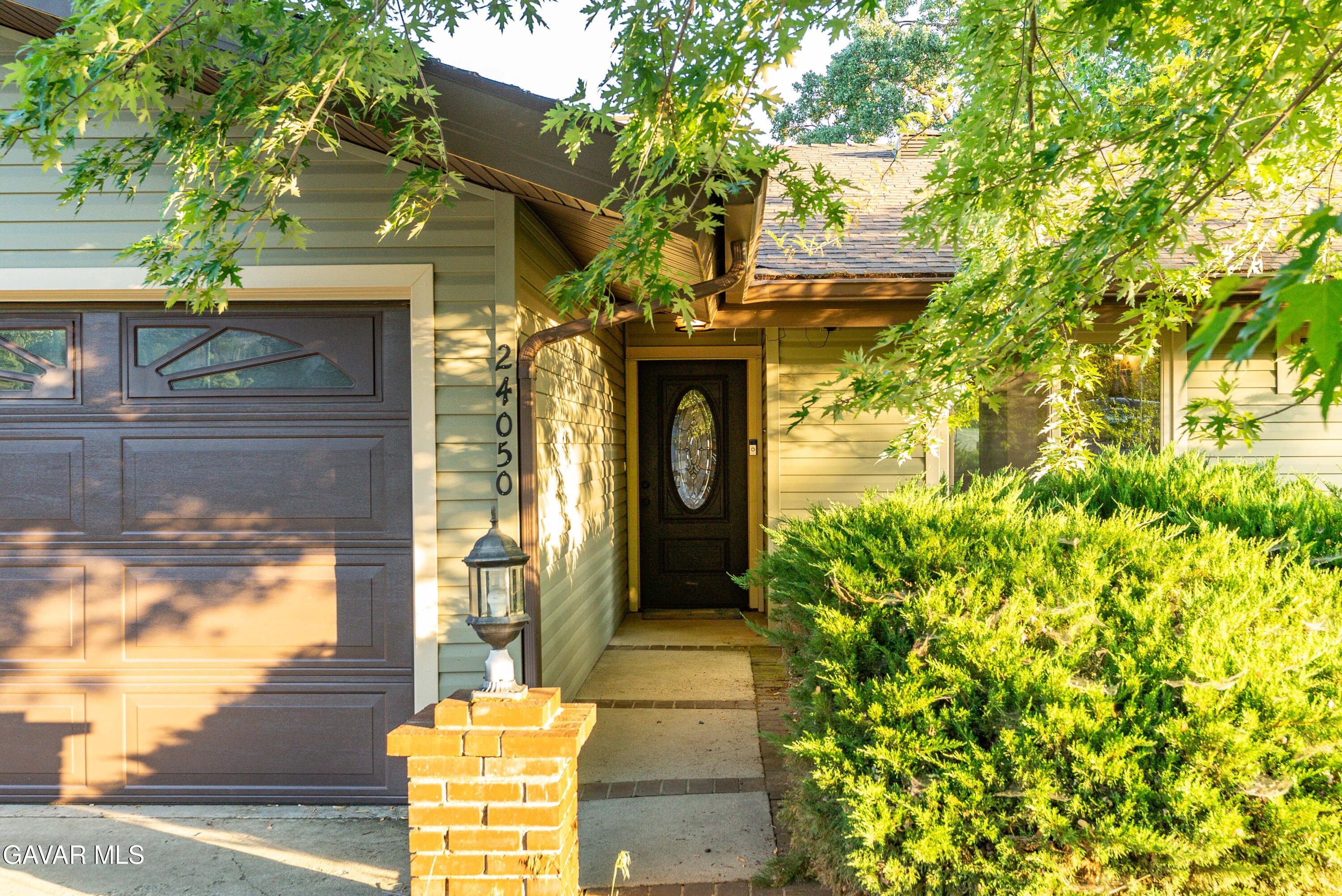 24050 Basin Harbor Court Tehachapi, CA 93561 - Photo 55 of 55 a front view of a house with a yard