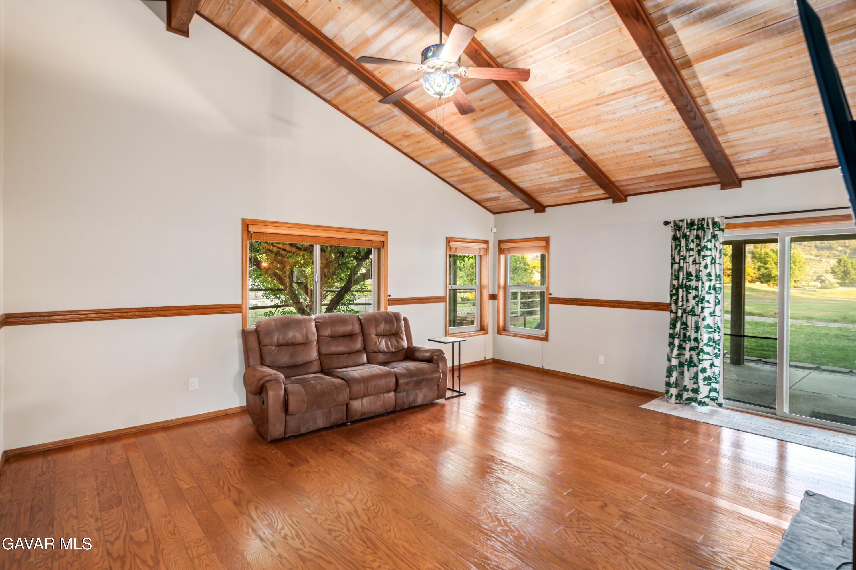 24050 Basin Harbor Court Tehachapi, CA 93561 - Photo 8 of 55 a living room with furniture and a large window