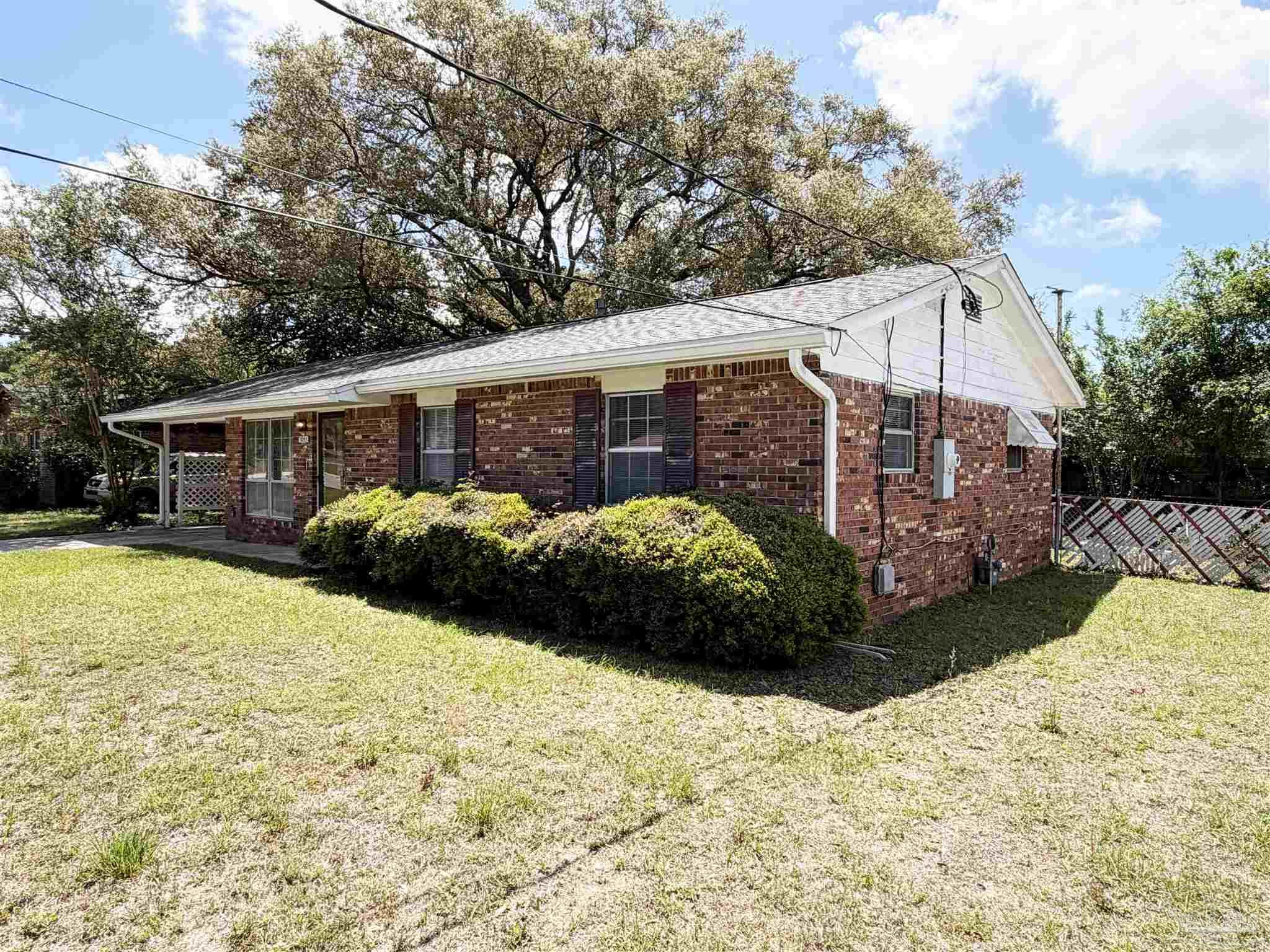 2053 Tomlinson Road Pensacola, FL 32526 - Photo 27 of 27 a view of a back yard of the house
