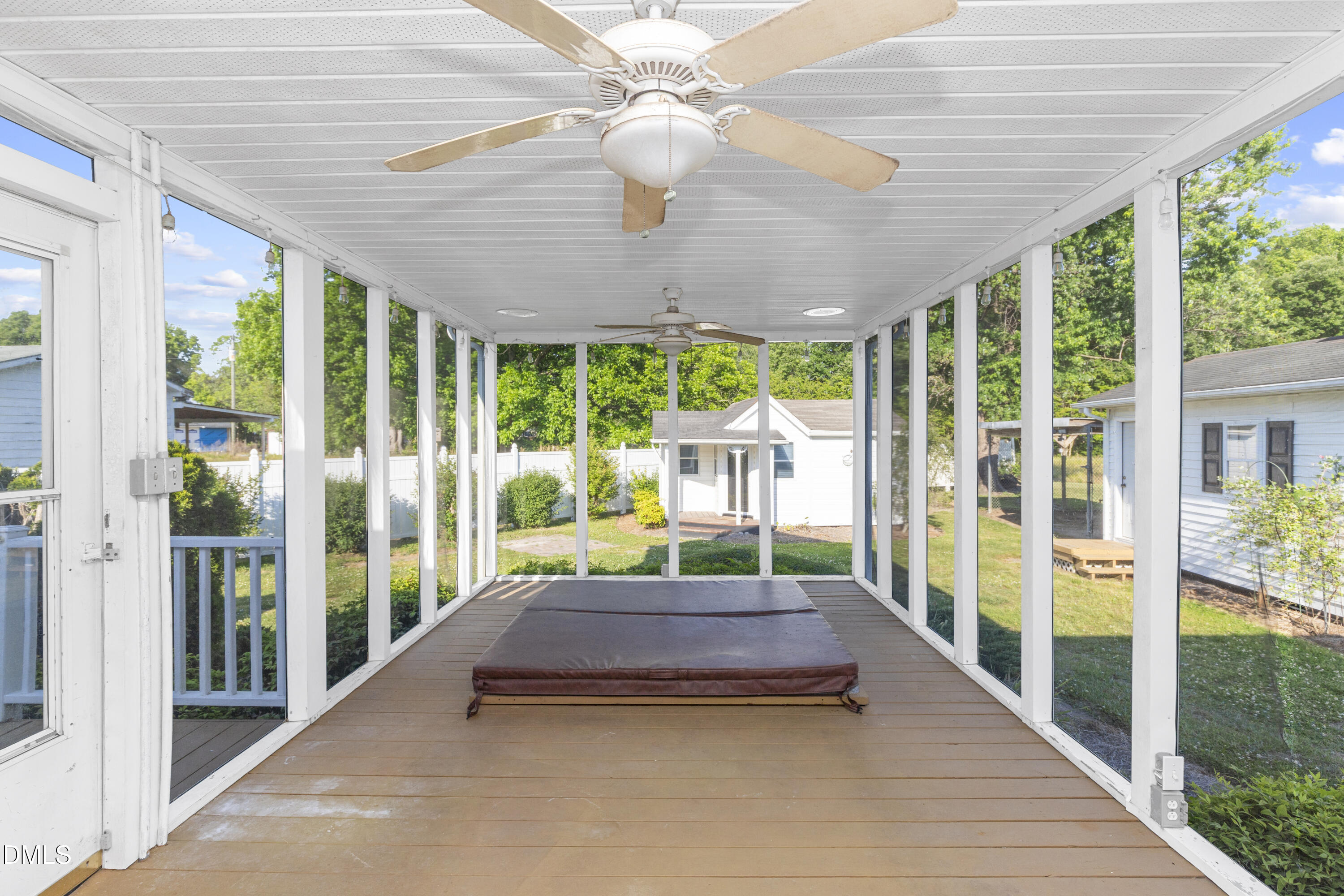 199 Iris Bryant Road Erwin, NC 28339 - Photo 19 of 33 a porch with a table and chairs