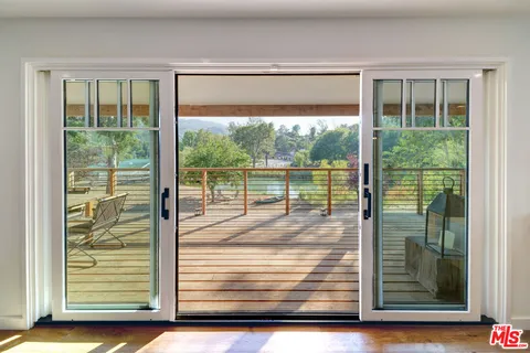 a view of a street with a building in the background