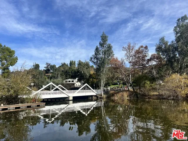 a view of a town with mountains in the background