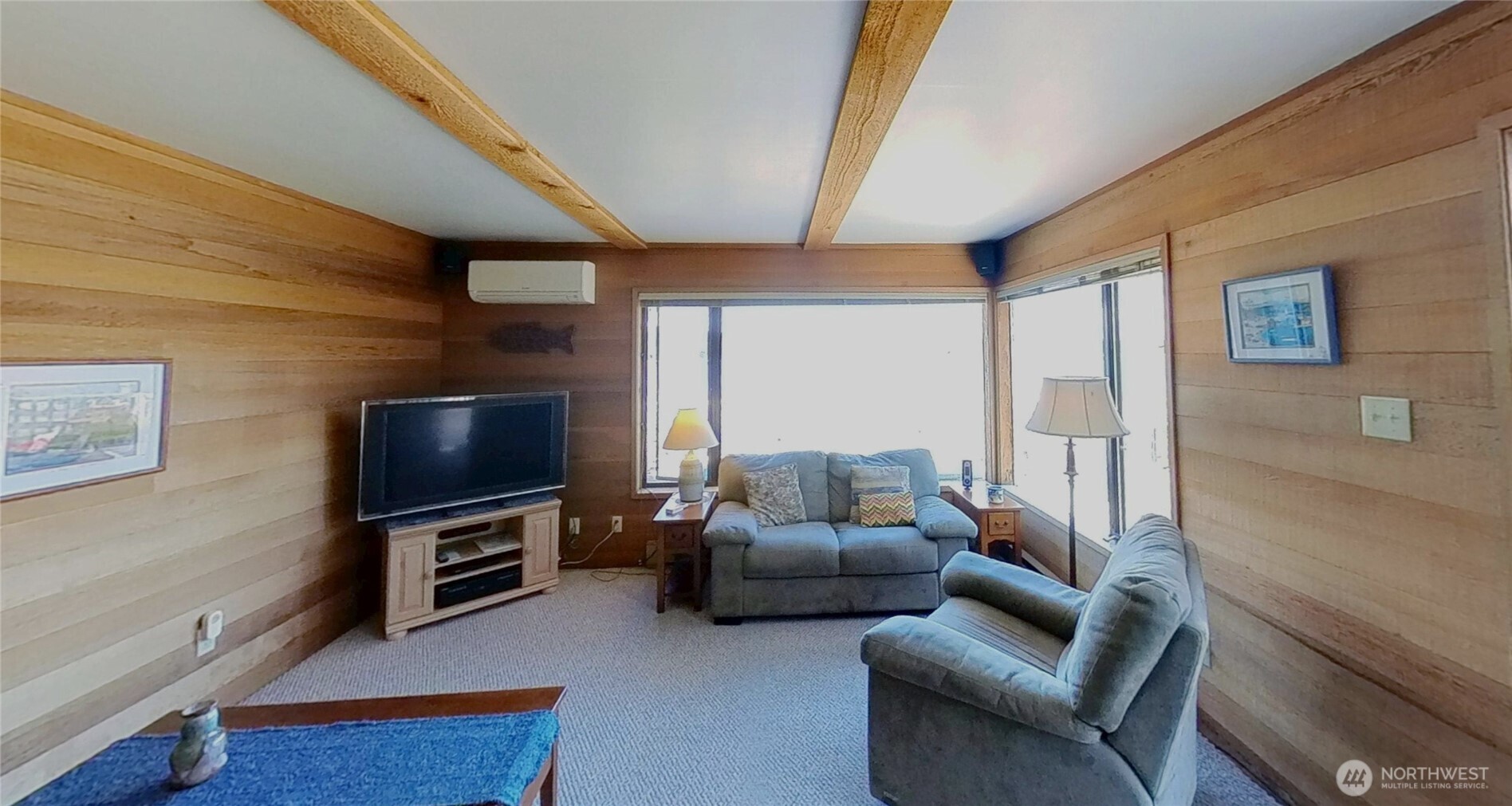 1671 Oak Bay Road Port Hadlock, WA 98339 - Photo 11 of 33 a living room with furniture and a flat screen tv