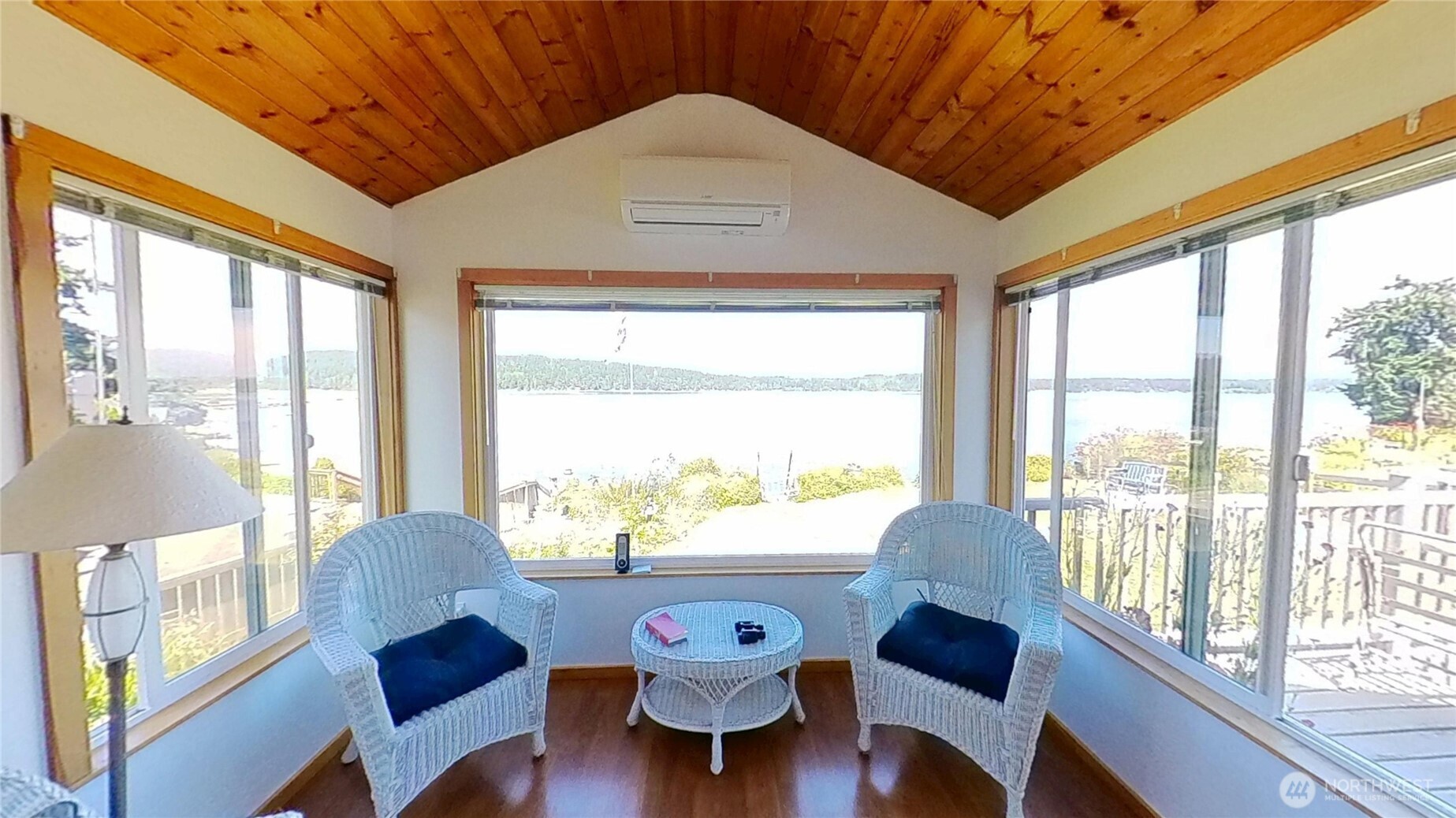 1671 Oak Bay Road Port Hadlock, WA 98339 - Photo 15 of 33 a living room with large windows