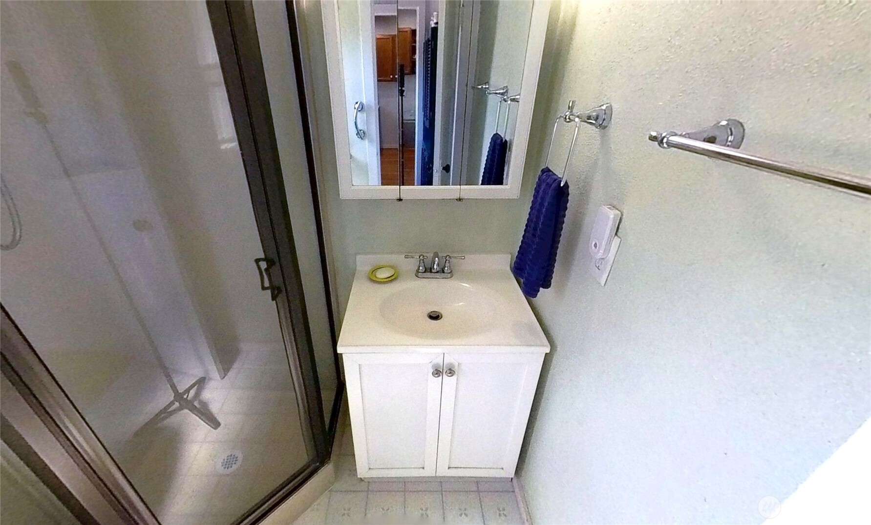 1671 Oak Bay Road Port Hadlock, WA 98339 - Photo 19 of 33 a bathroom with a sink and mirror with toilet