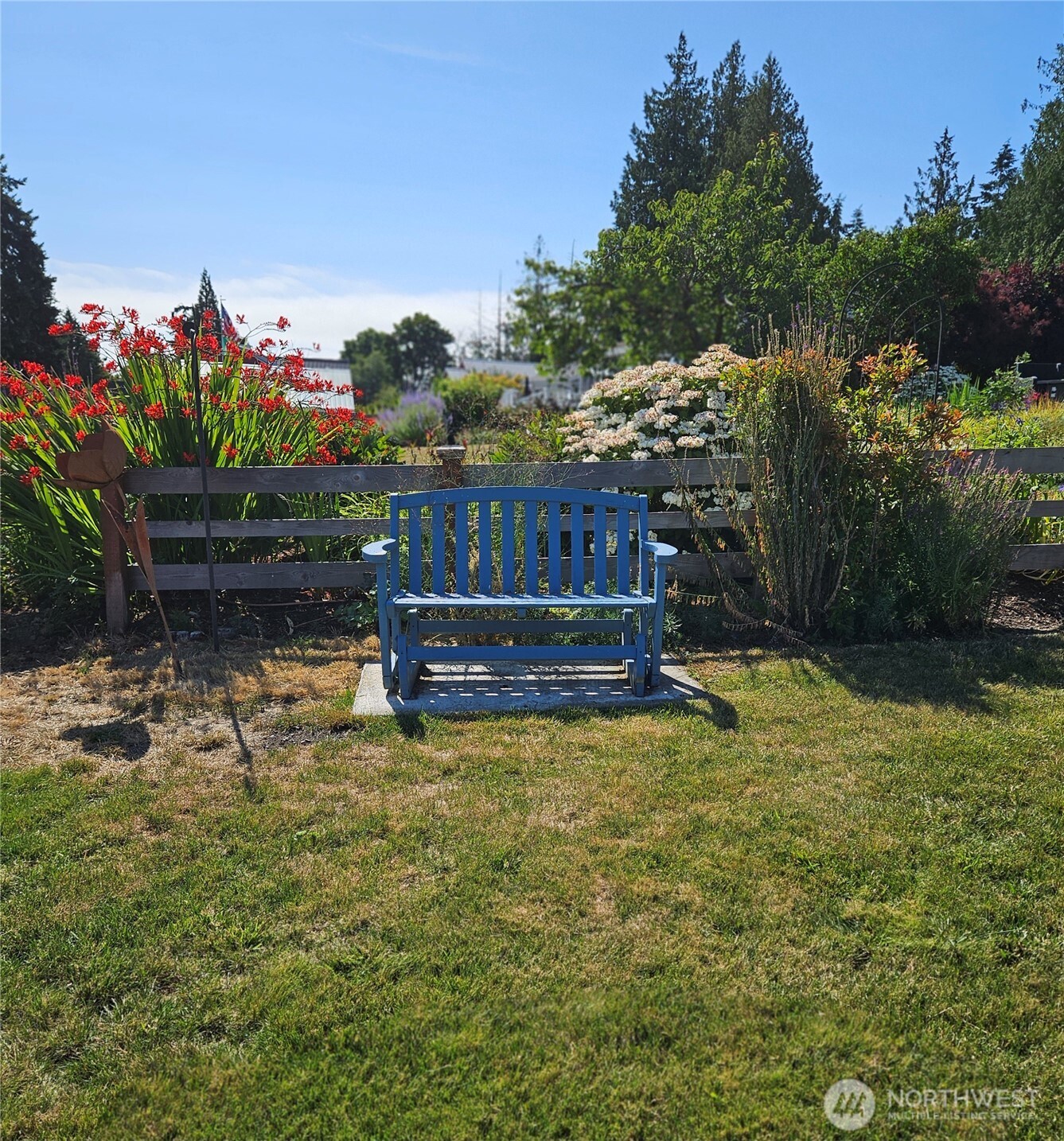 1671 Oak Bay Road Port Hadlock, WA 98339 - Photo 30 of 33 a swimming pool with outdoor seating and trees