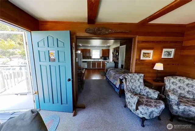 a living room with furniture and a window