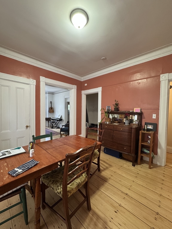 5 Spring Park Avenue, Unit 1 Boston, MA 02130 - Photo 4 of 24 a room with furniture pool table and wooden floor