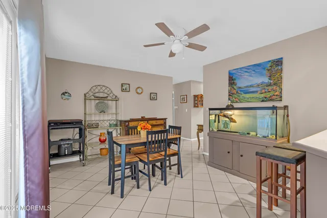 a view of living room with granite countertop furniture and fireplace