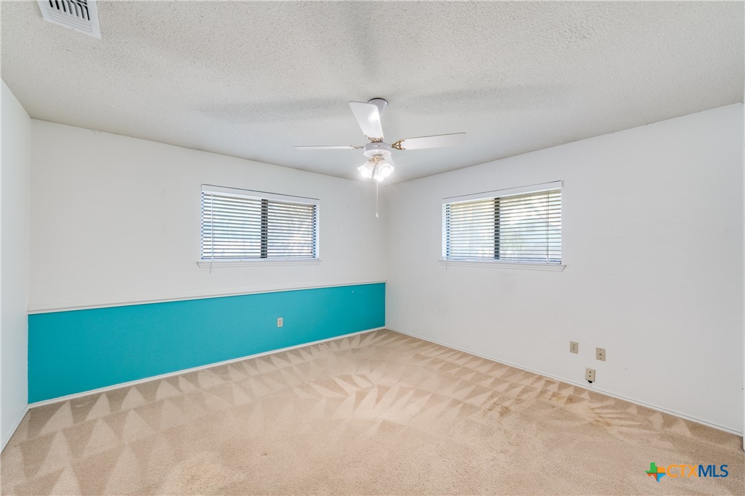 111 Oldtowne Road Seguin, TX 78155 - Photo 20 of 31 a view of an empty room with window