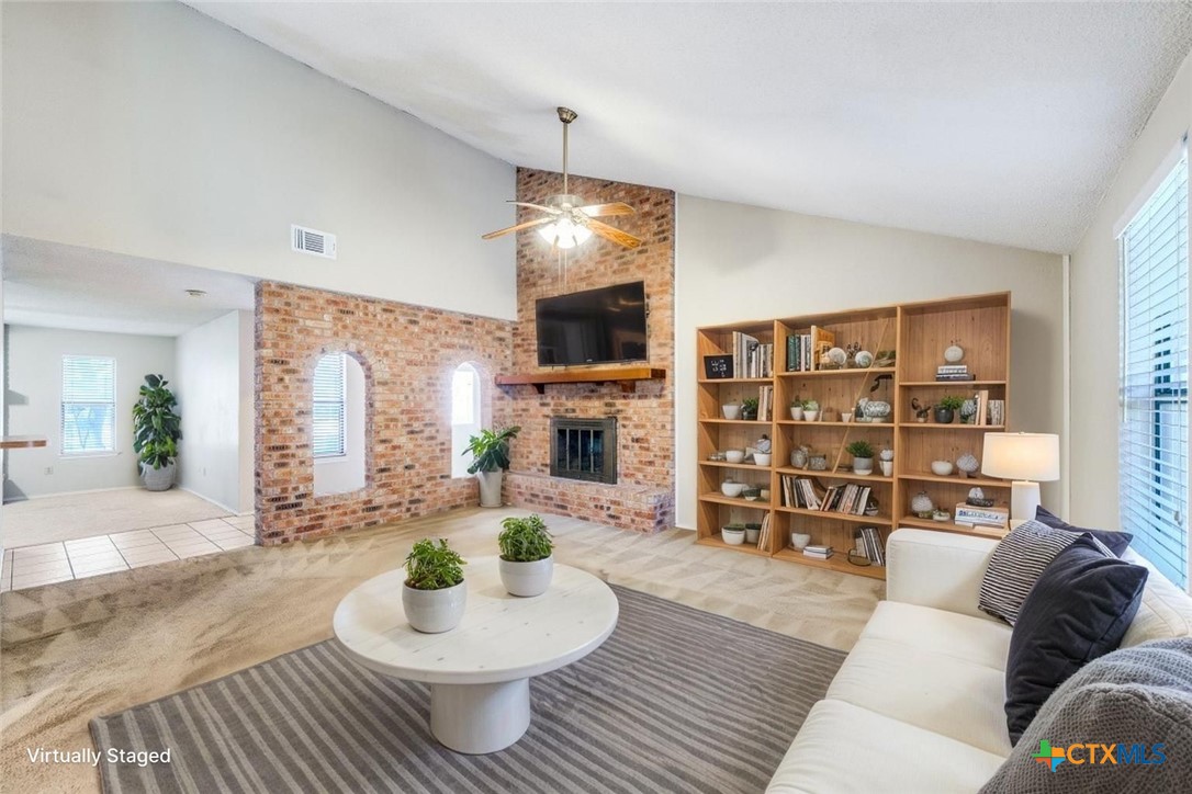 111 Oldtowne Road Seguin, TX 78155 - Photo 6 of 31 a living room with furniture and a wooden floor