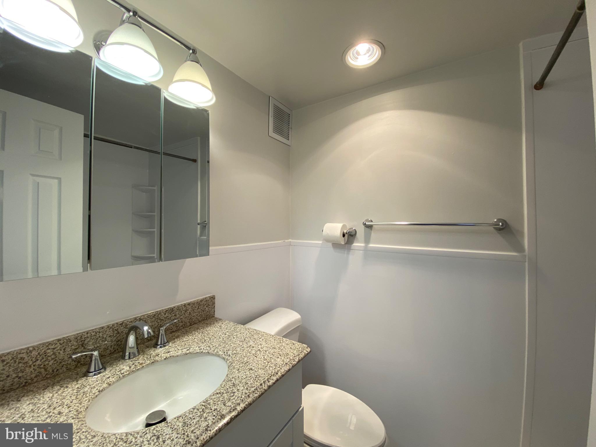 5340 Holmes Run Parkway, Unit 1003 Alexandria, VA 22304 - Photo 8 of 9 Updated bathroom w/ heat lamp for warm showers.