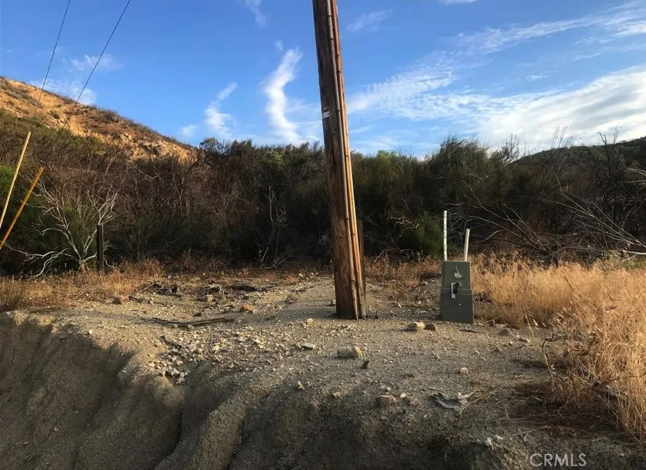 0 Gully View Drive Anza, CA 92539 - Photo 3 of 9 a view of a yard with wooden fence