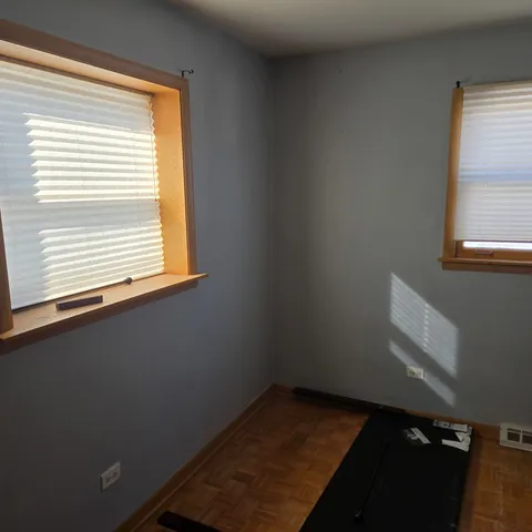 a view of a room that has a window
