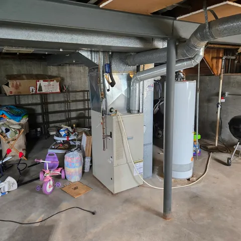 a room with furniture and gym equipment