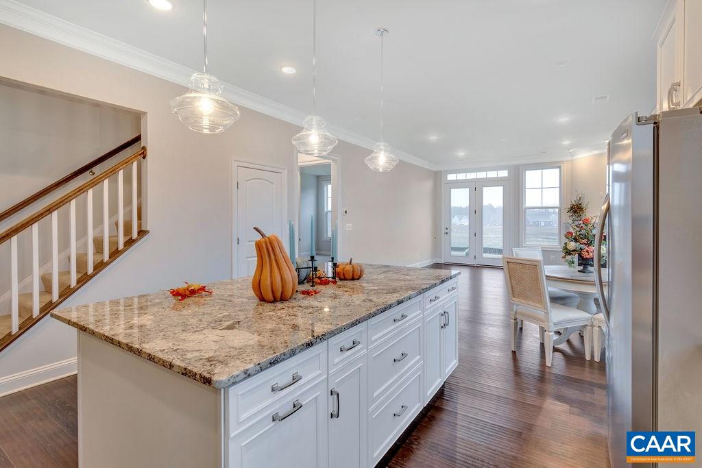 379 Claibourne Road Crozet, VA 22932 - Photo 18 of 38 a bathroom with a granite countertop sink and a large mirror