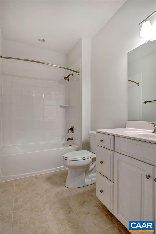 379 Claibourne Road Crozet, VA 22932 - Photo 31 of 38 a bathroom with a sink a toilet and bathtub
