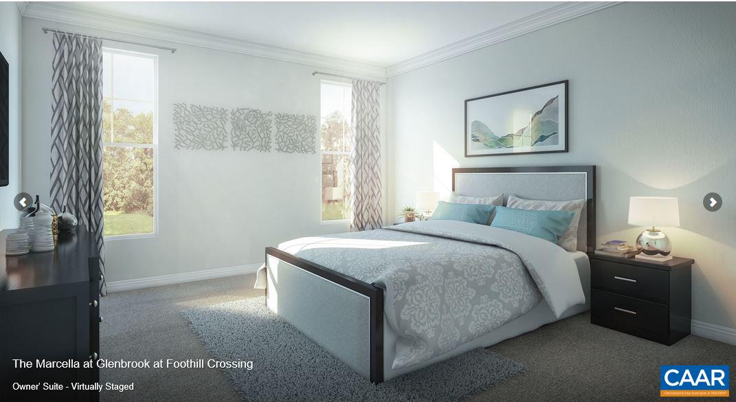 379 Claibourne Road Crozet, VA 22932 - Photo 7 of 38 a bedroom with a bed and a painting on the wall