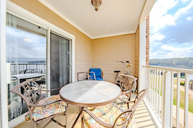 a view of a balcony furniture and livingroom view