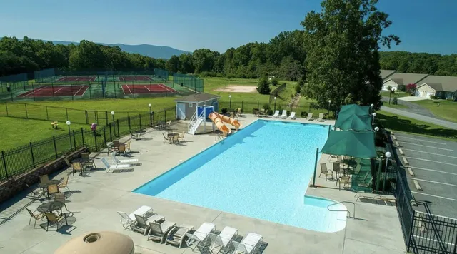 a view of a lake with a yard