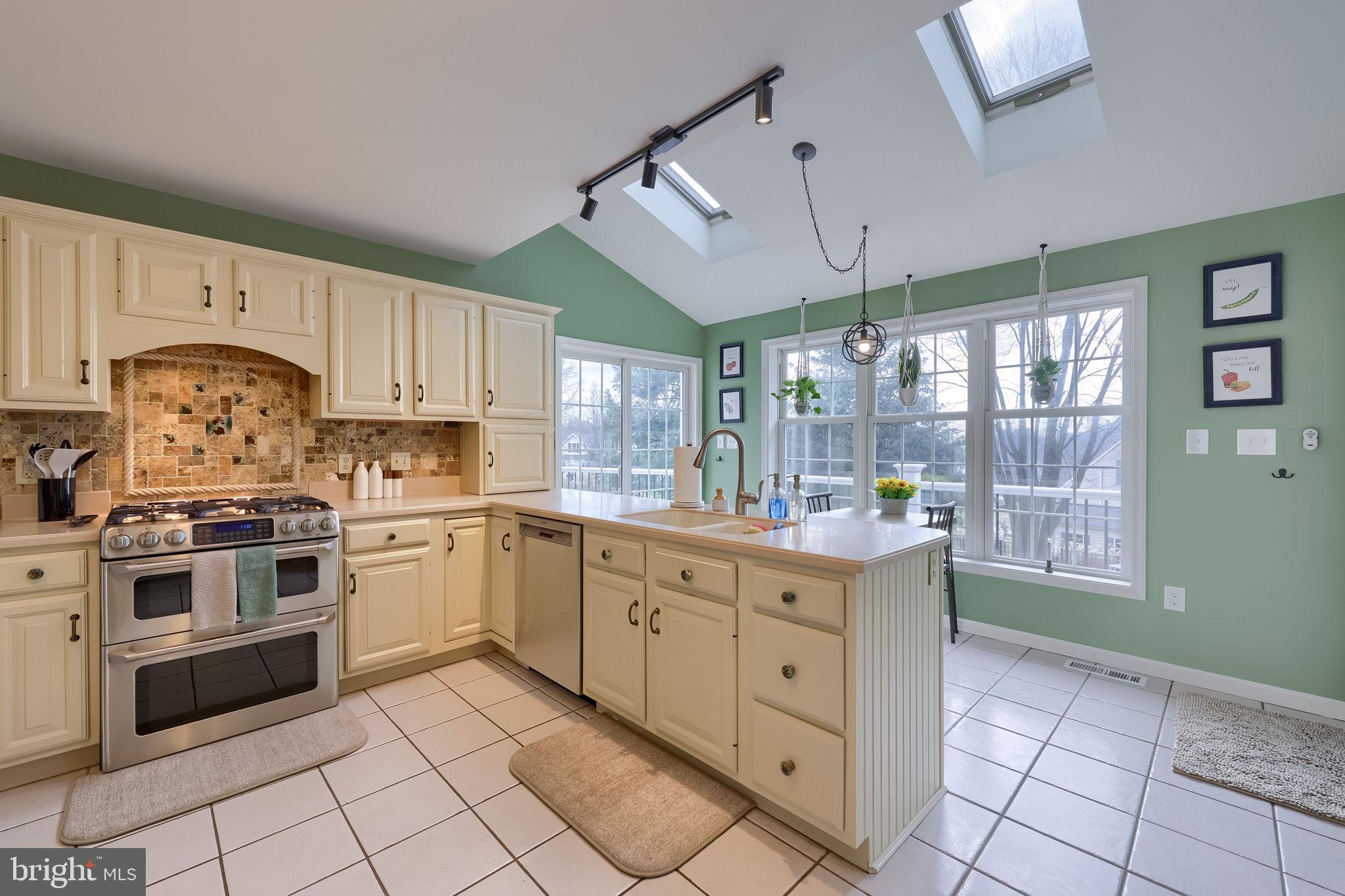 22 Royal Drive Lititz, PA 17543 - Photo 13 of 47 a kitchen with a stove window and cabinets