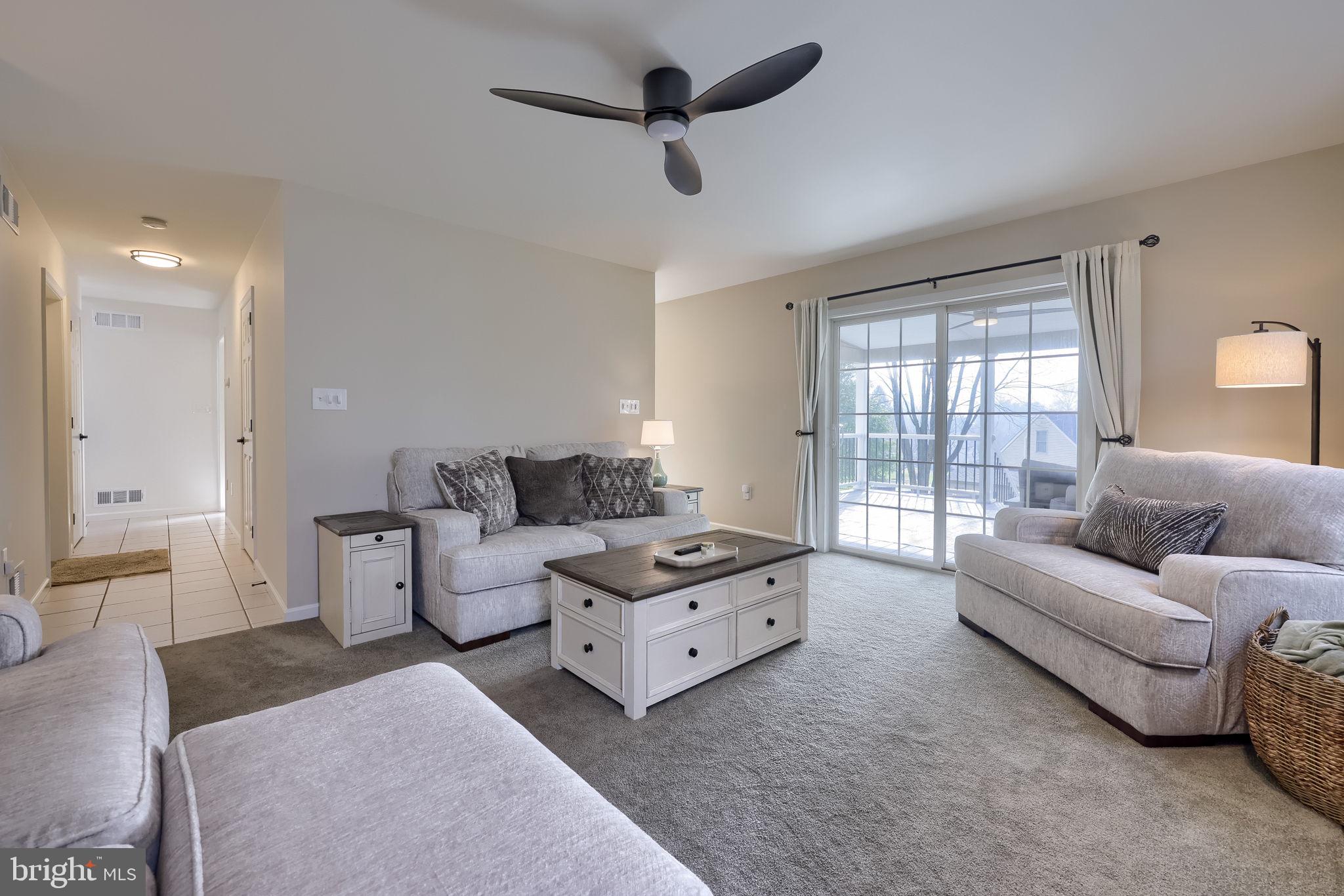 22 Royal Drive Lititz, PA 17543 - Photo 19 of 47 a living room with furniture and a large window
