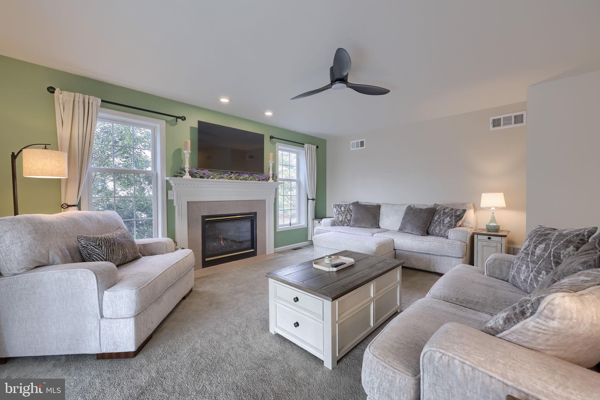 22 Royal Drive Lititz, PA 17543 - Photo 21 of 47 a living room with furniture and a fireplace