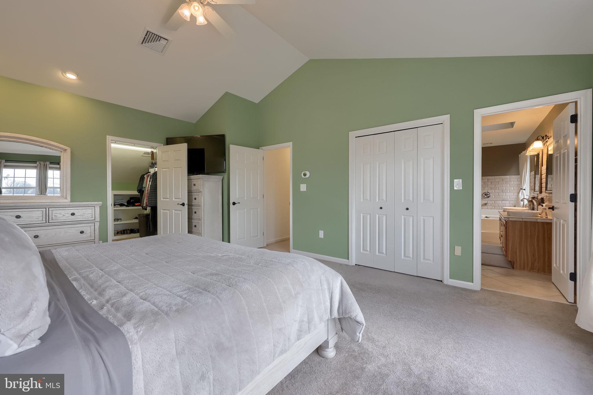 22 Royal Drive Lititz, PA 17543 - Photo 25 of 47 a spacious bedroom with a bed and a view of bathroom