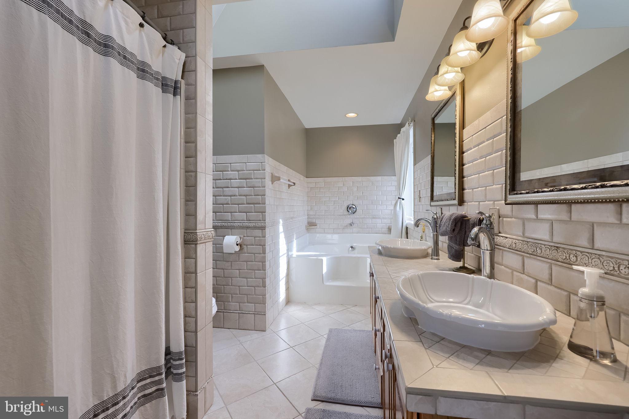 22 Royal Drive Lititz, PA 17543 - Photo 28 of 47 a kitchen with a sink refrigerator and cabinets