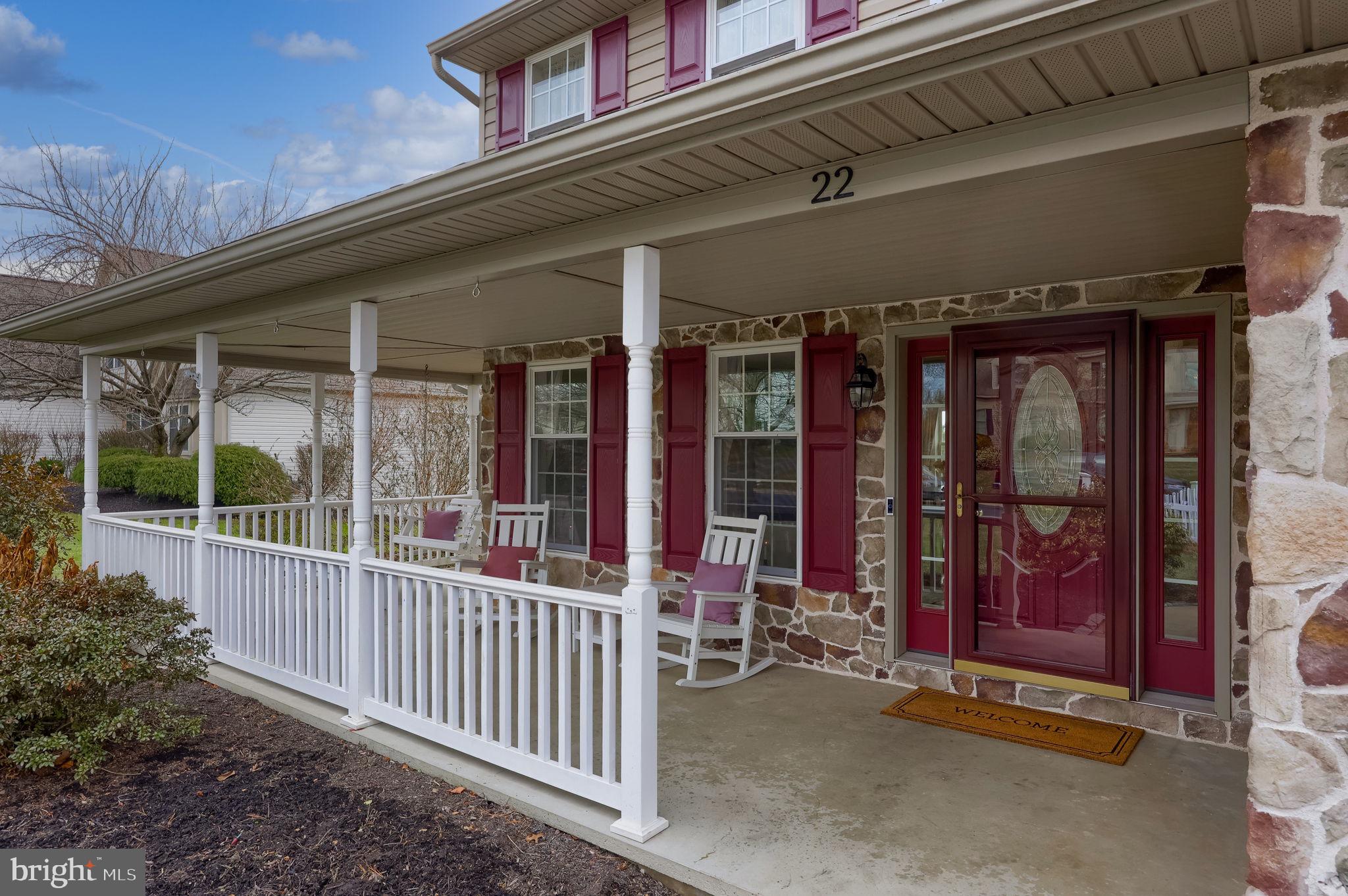 22 Royal Drive Lititz, PA 17543 - Photo 3 of 47 a view of a porch with a table and chairs