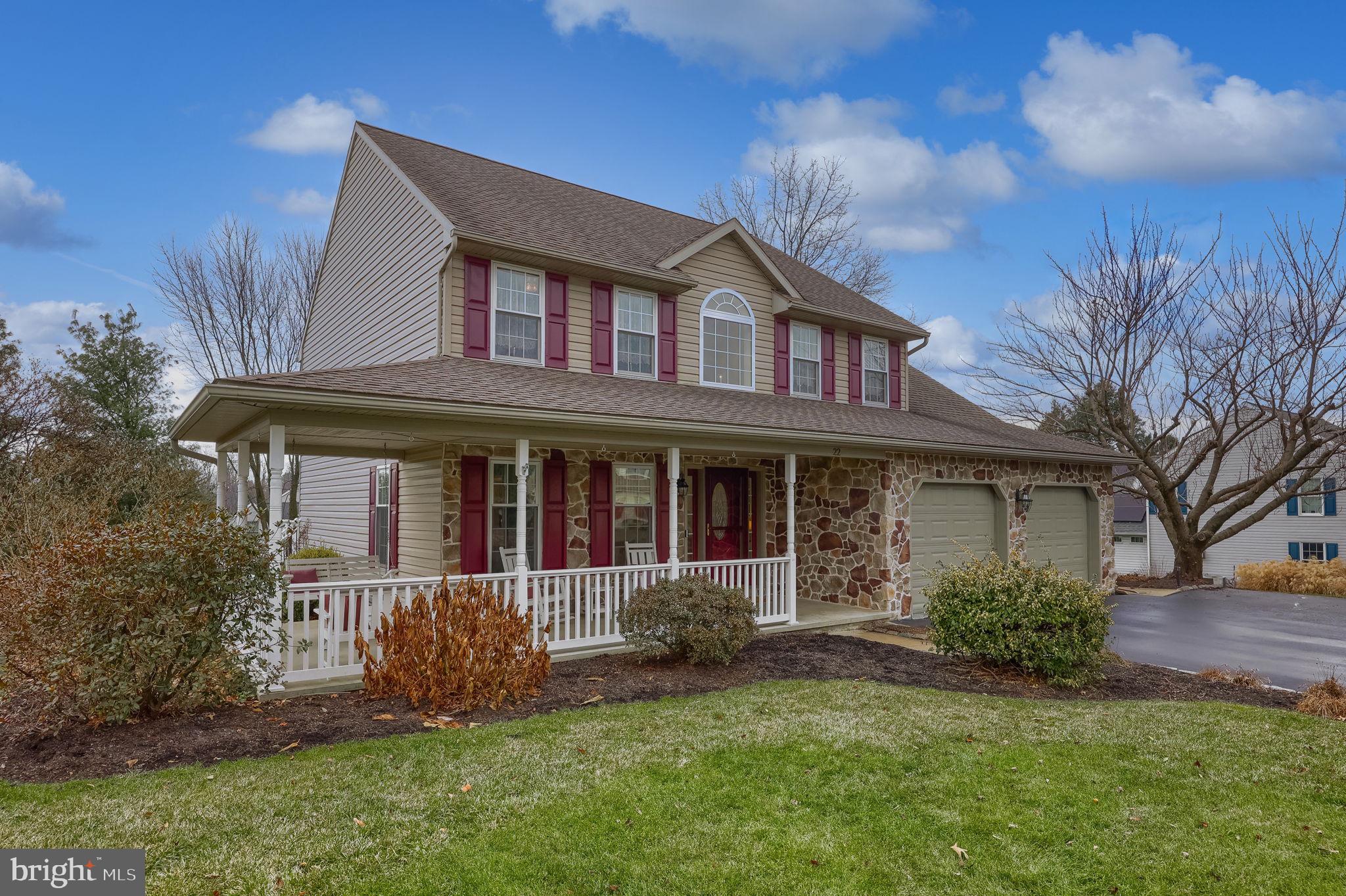22 Royal Drive Lititz, PA 17543 - Photo 4 of 47 a front view of a house with a garden and yard