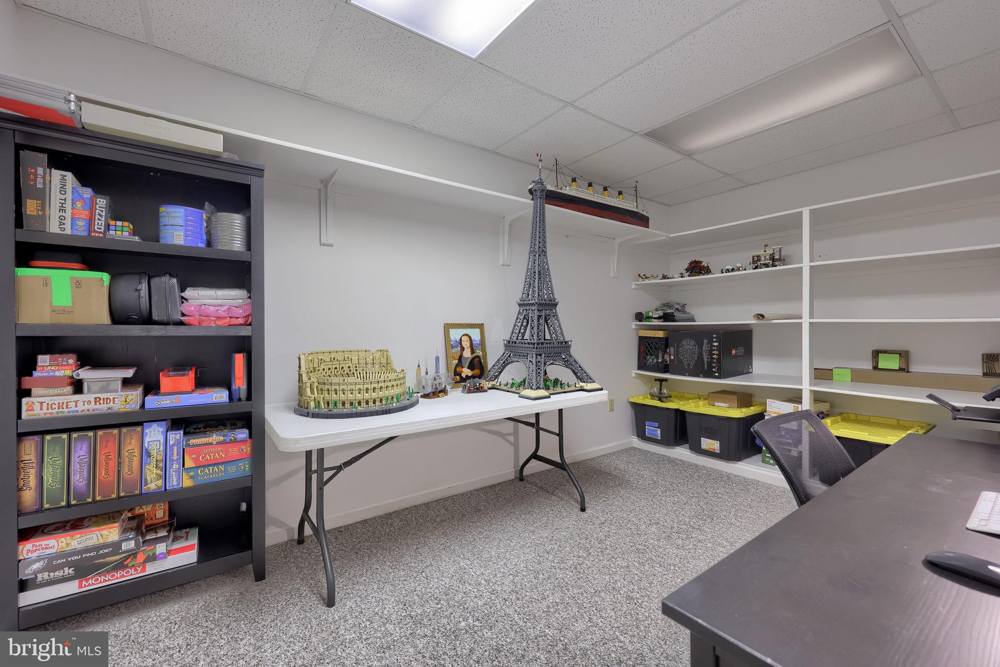 22 Royal Drive Lititz, PA 17543 - Photo 41 of 47 a living room with furniture and a book shelf