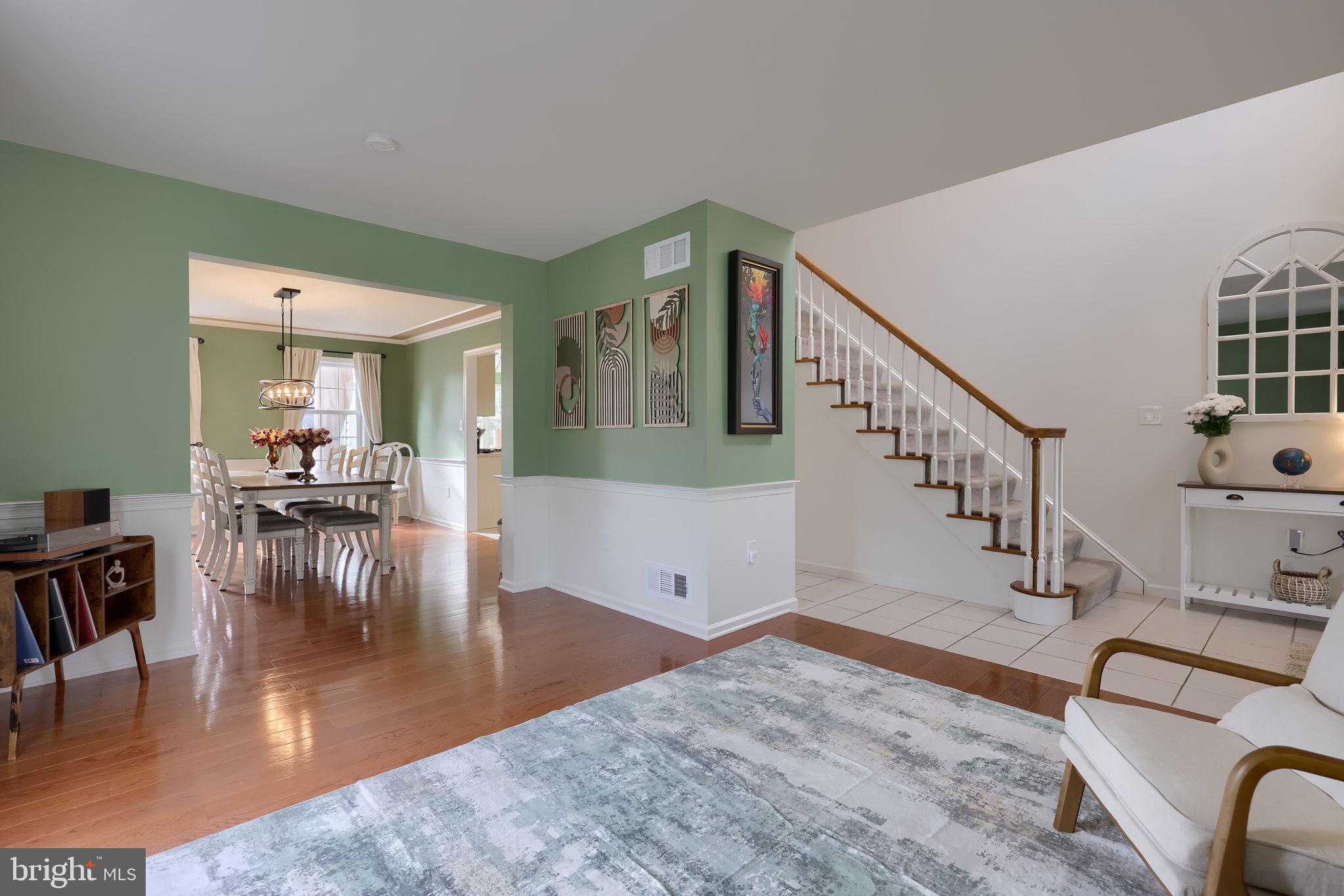 22 Royal Drive Lititz, PA 17543 - Photo 8 of 47 a view of a livingroom with furniture and wooden floor
