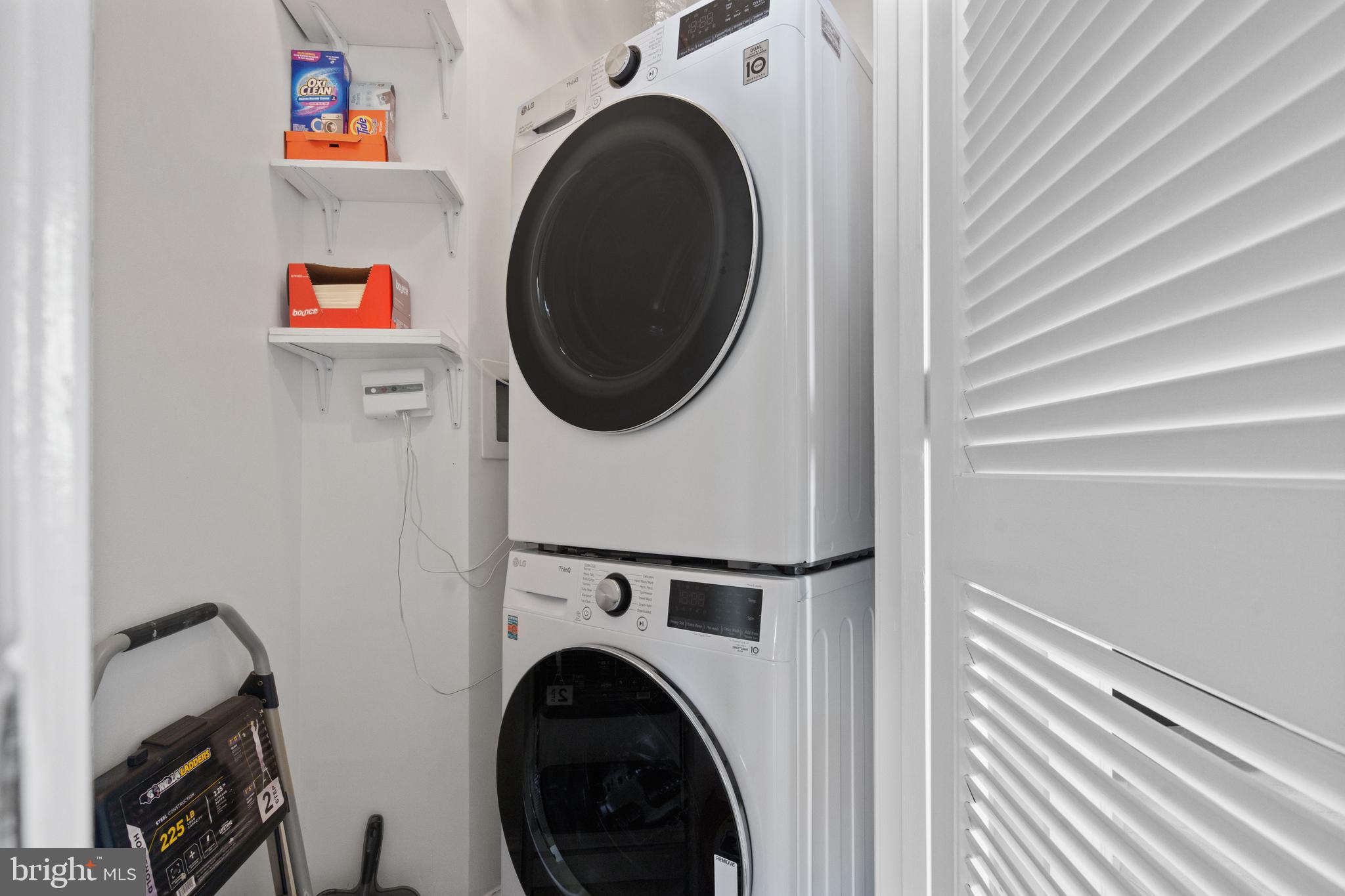 11990 Market Street, Unit 813 Reston, VA 20190 - Photo 18 of 48 a utility room with dryer and washer
