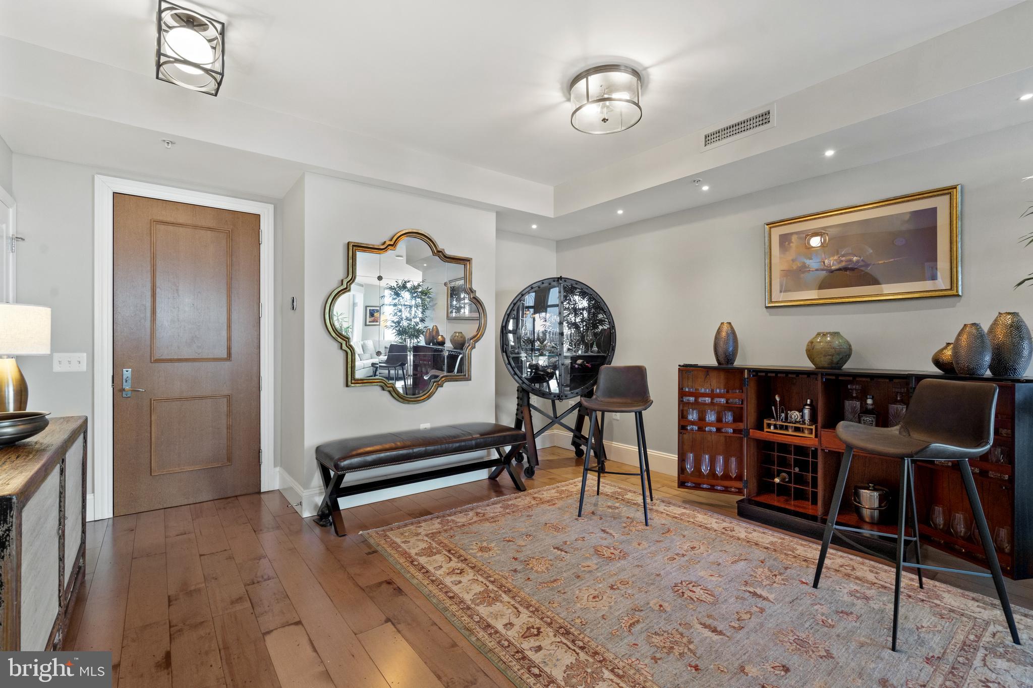 11990 Market Street, Unit 813 Reston, VA 20190 - Photo 2 of 48 a view of a livingroom with furniture