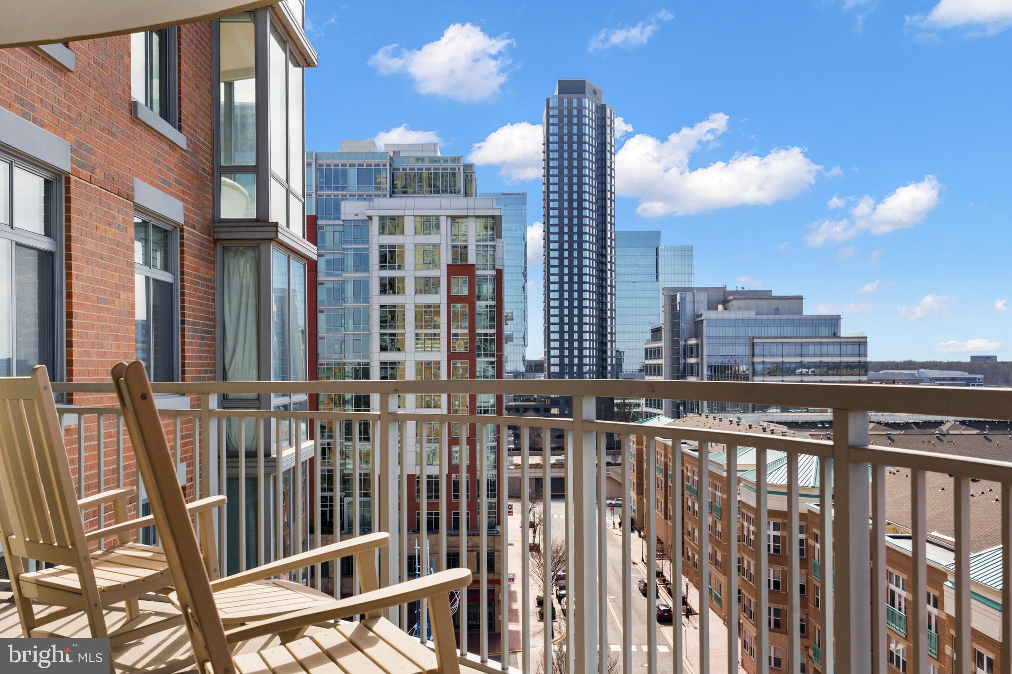 11990 Market Street, Unit 813 Reston, VA 20190 - Photo 25 of 48 a view of buildings from a balcony